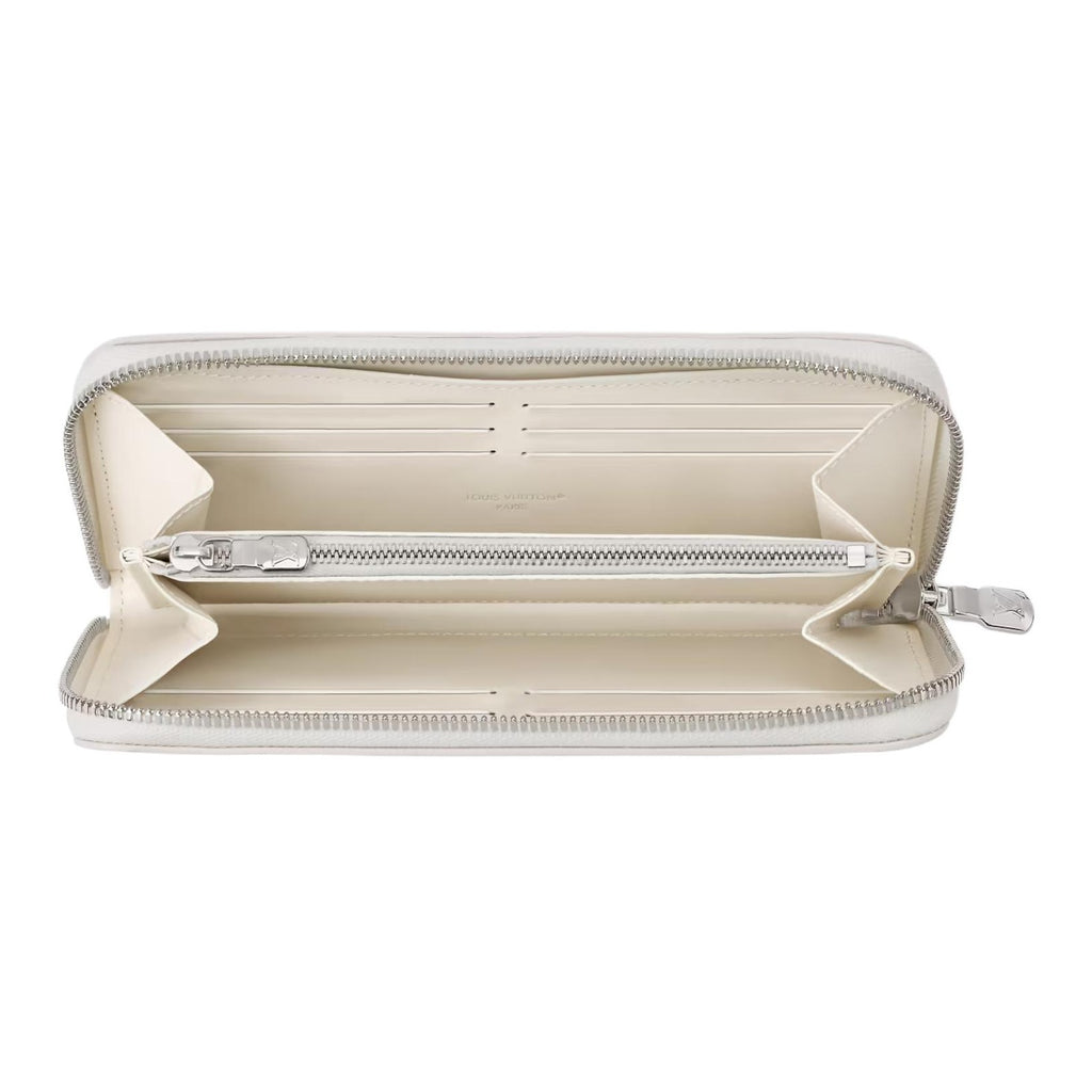 LOUIS VUITTON Zippy Monogram Shadow Calfskin Zip Wallet - Off-White - M29133